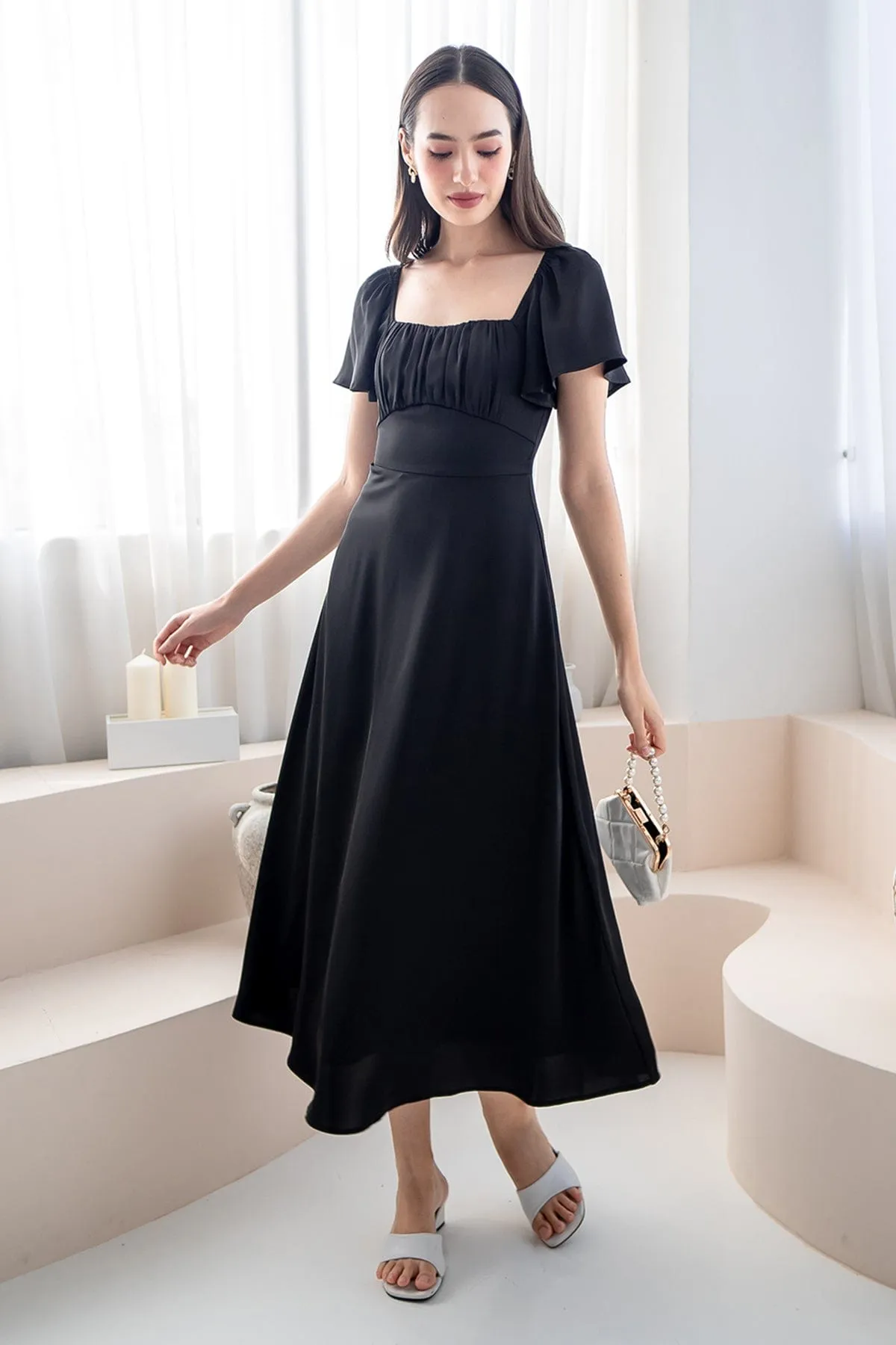 CARMELLIA FLUTTERS MAXI DRESS IN BLACK