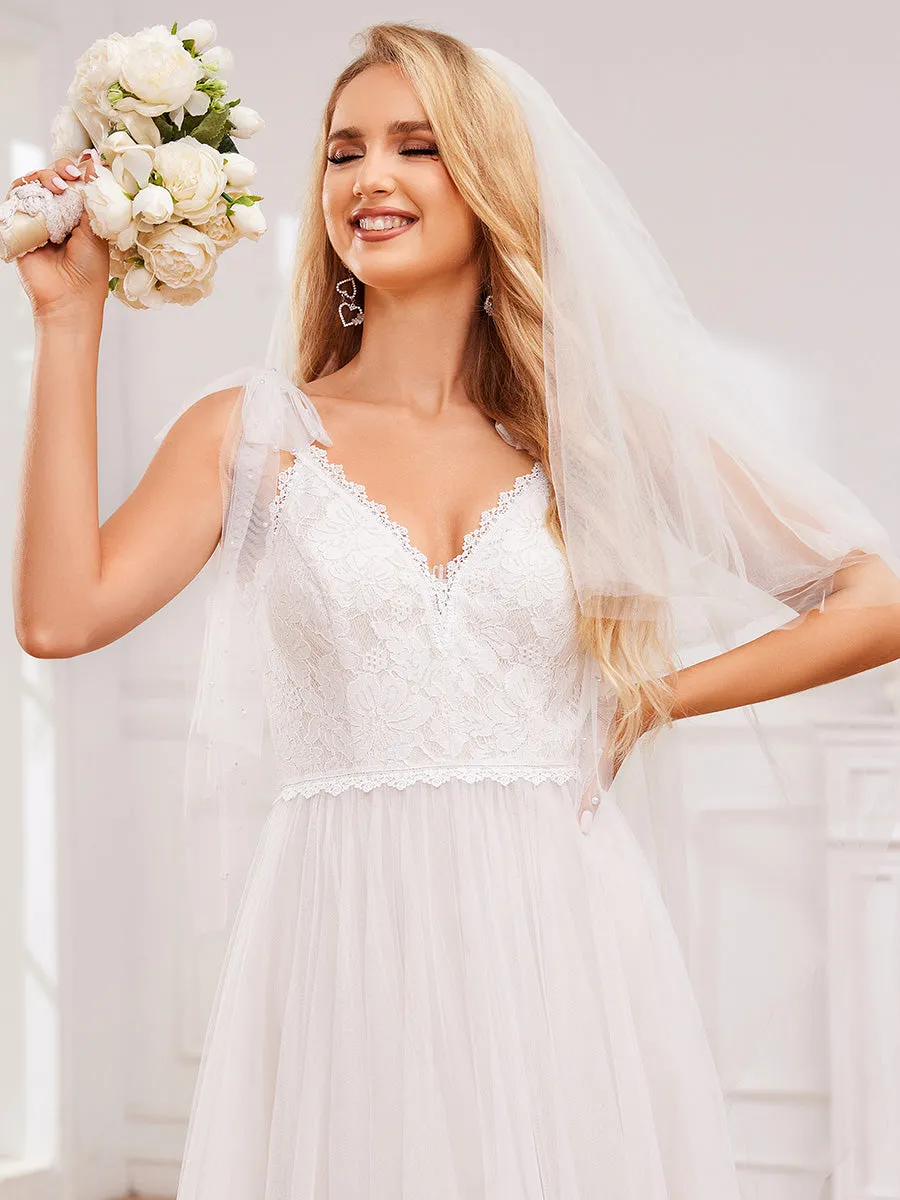 Exquisite Deep V Neck Sleeveless Lace Tulle Empire Waist Wedding Dresses with Bowknot Bandage